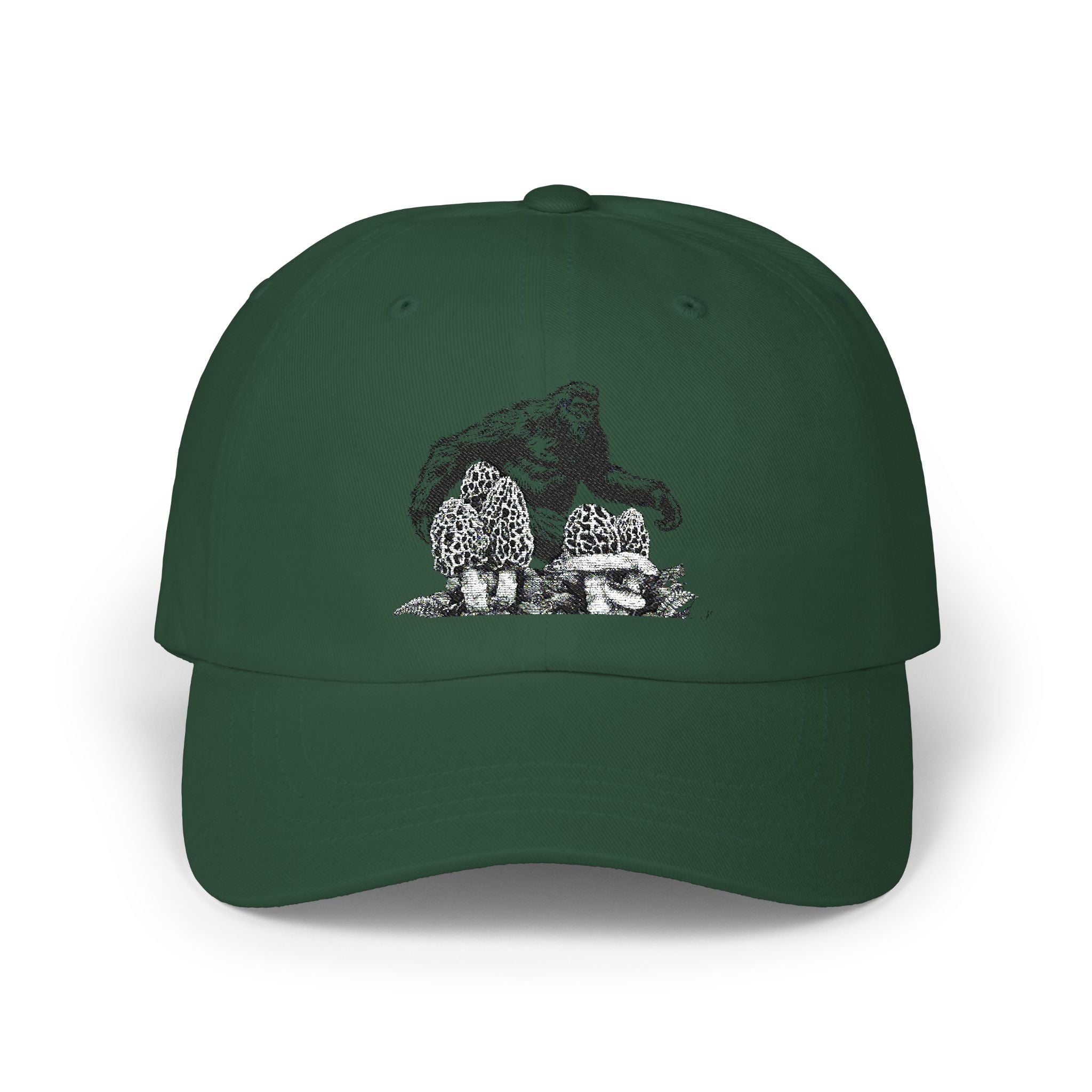 Green cap with graphic of a bigfoot and morel mushrooms on a white background