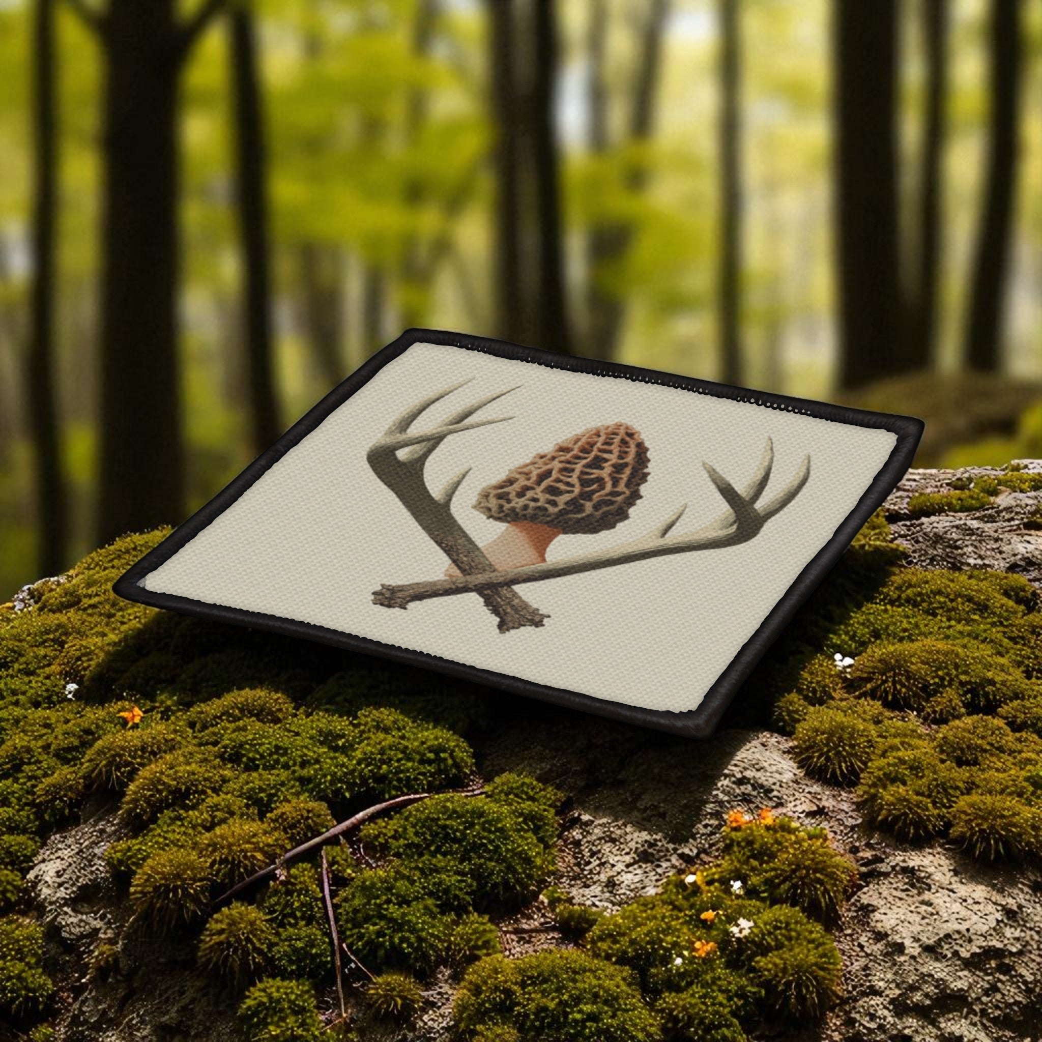 Patch with mushroom and antler design on a forest background