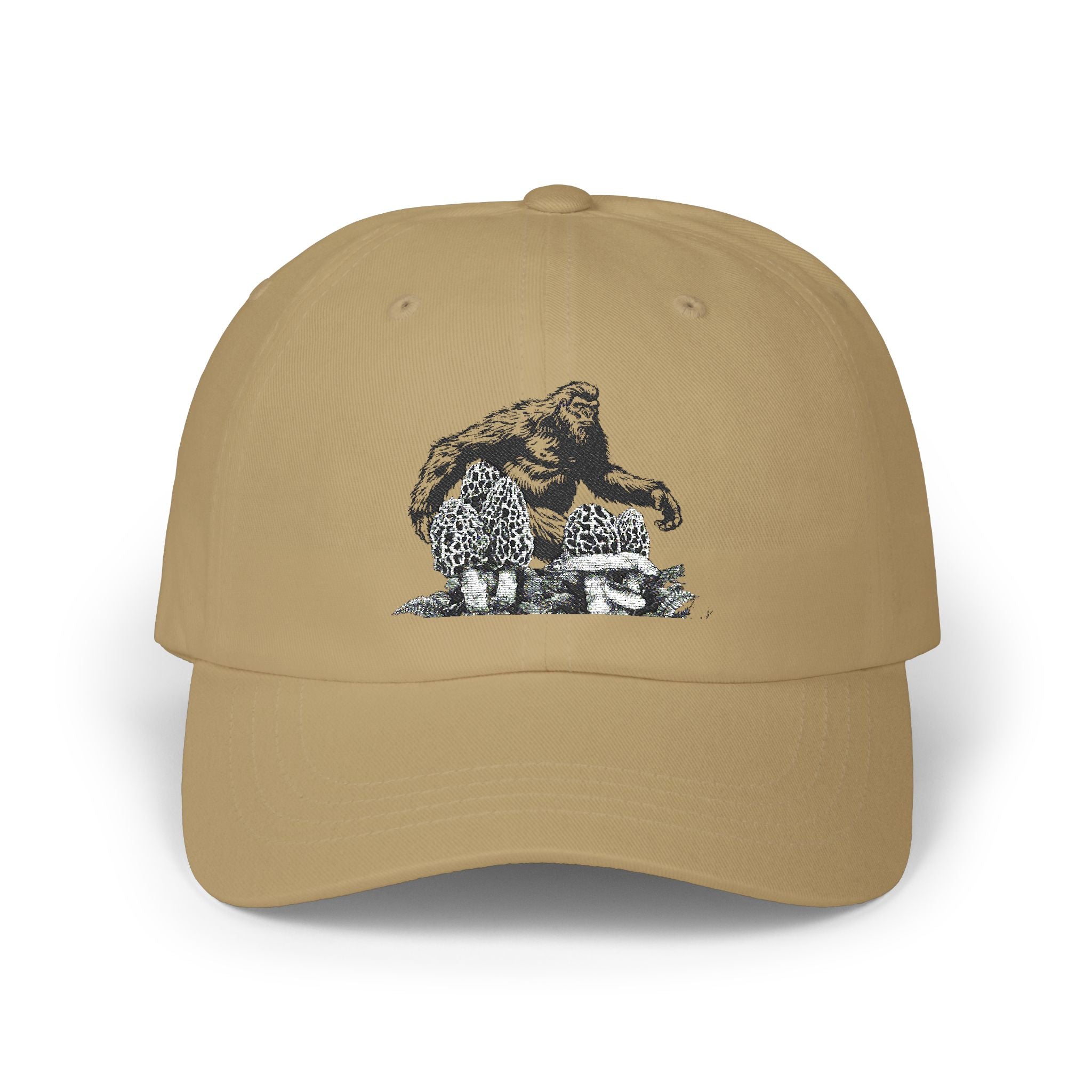Khaki cap with a graphic graphic of a bigfoot and morel mushrooms on a white background