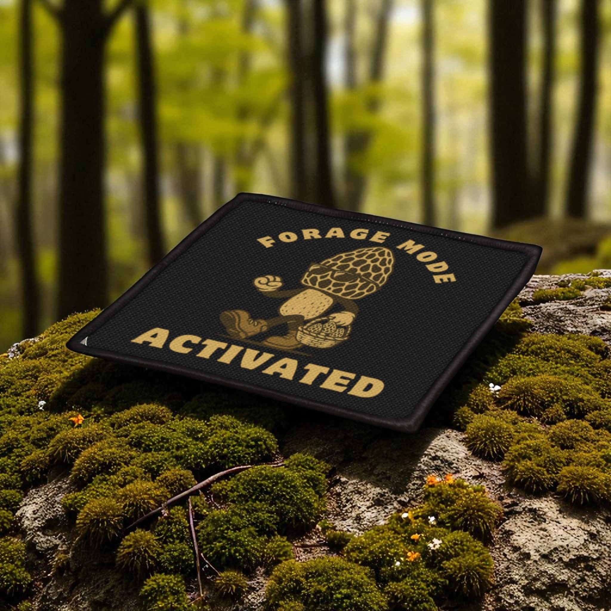 Patch with 'Forage Mode Activated' text on a mossy tree trunk in a forest setting